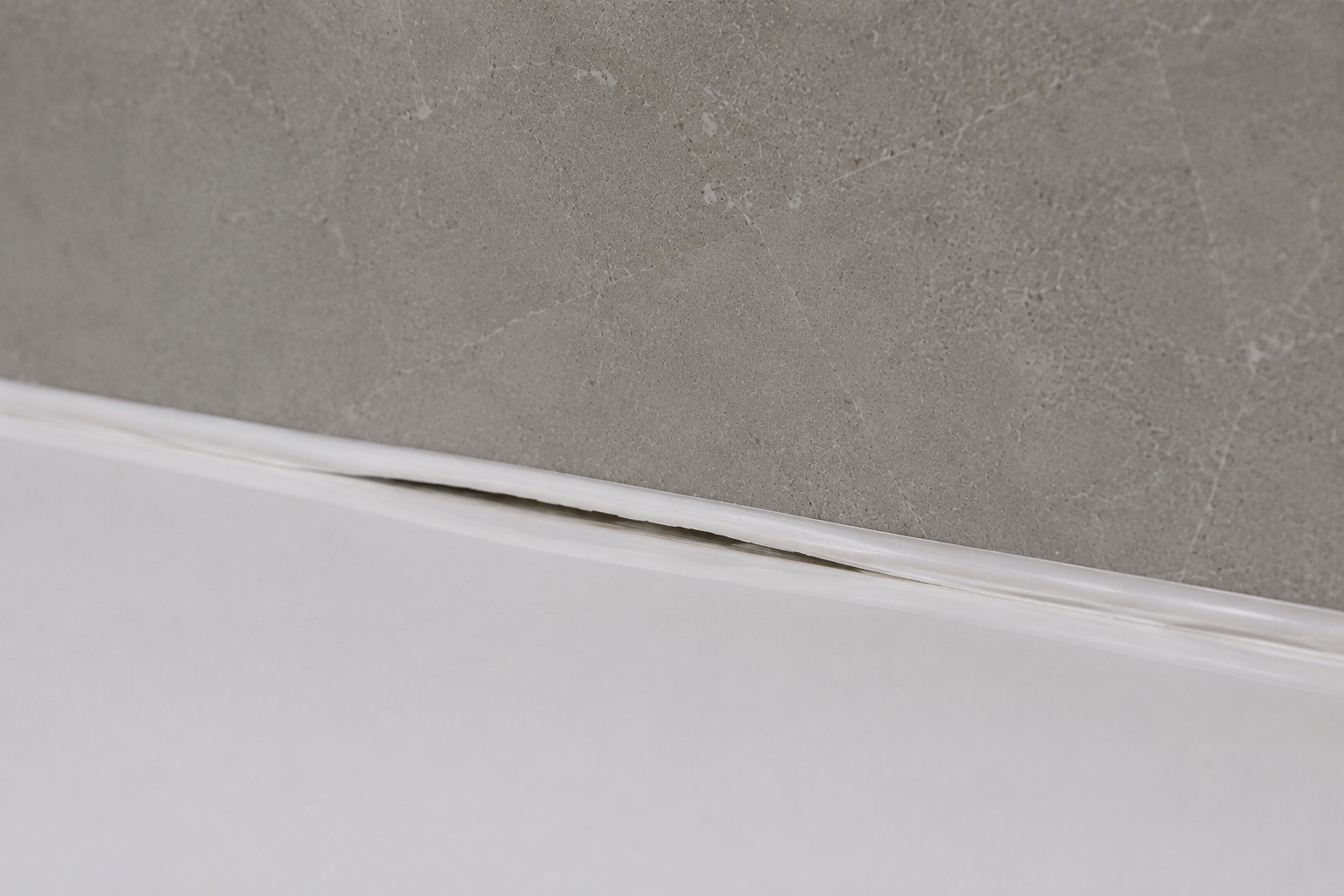 Silicone sealant coming loose in bathroom